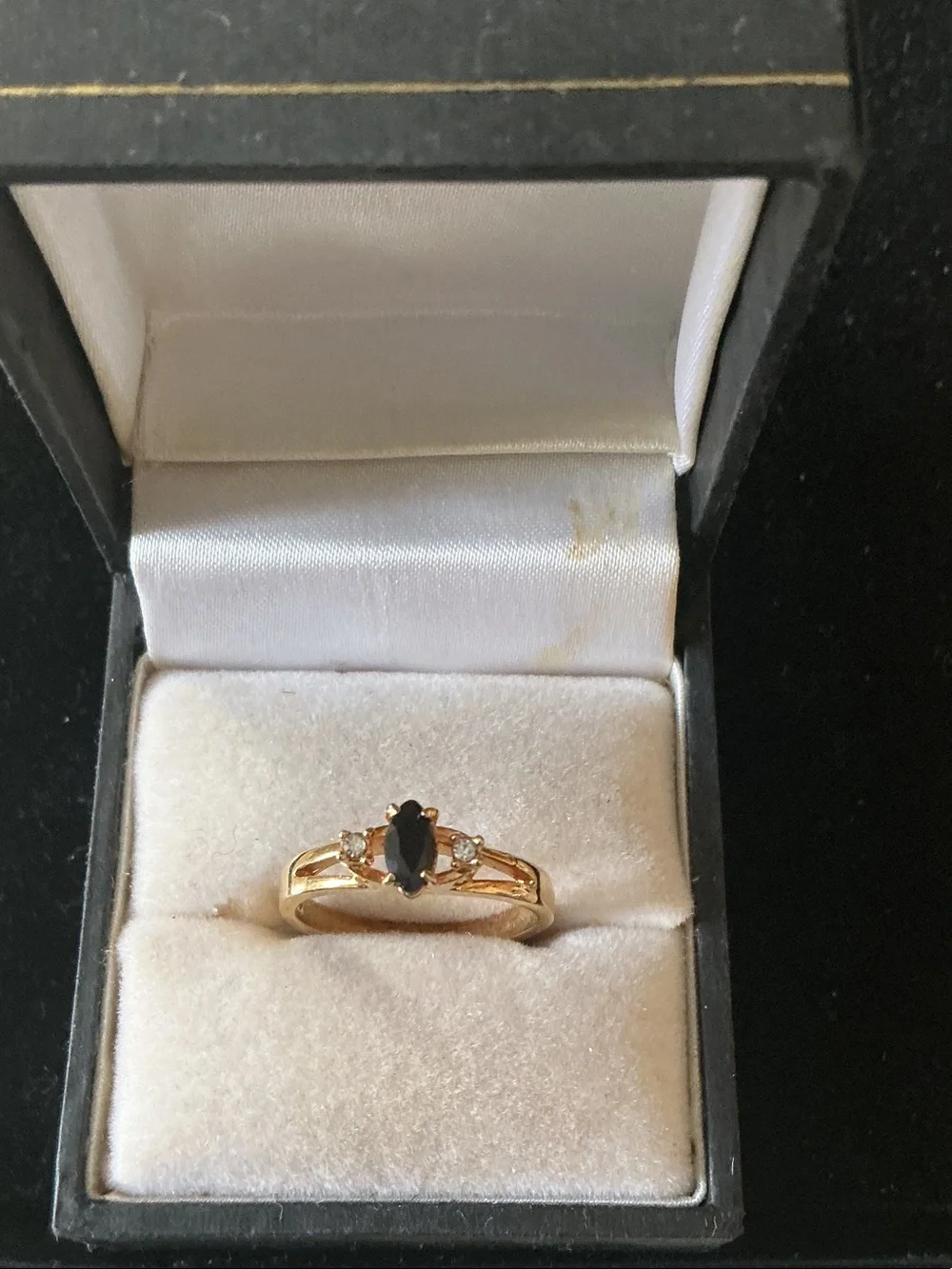 Gold Ring with Black Marquise Center and Clear Accent Stones